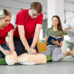 A Trainer Training Student about CPR Treatment